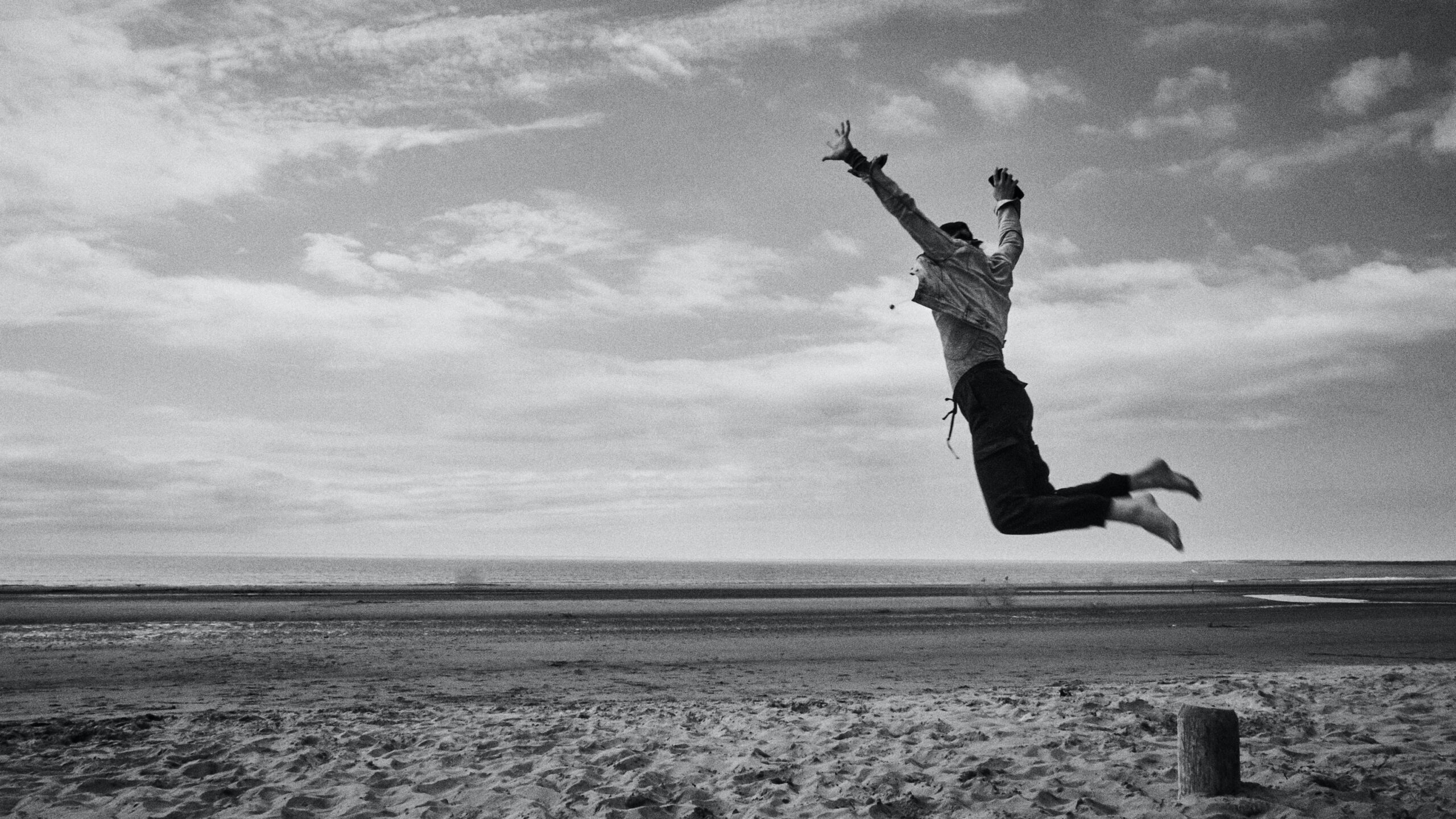 Man jumping off into space